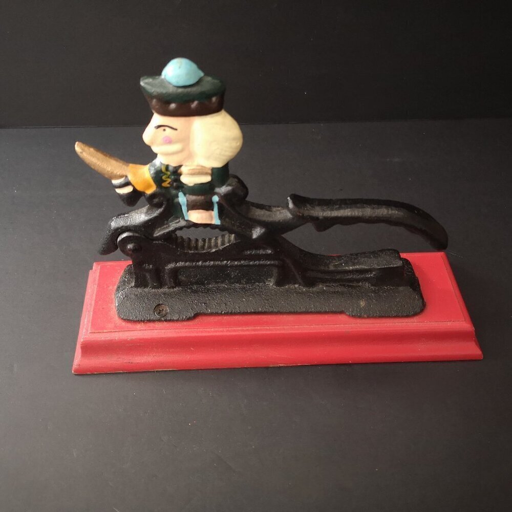Vintage Cast Iron Nut Cracker on a Red Wooden Base Christmas Soldier